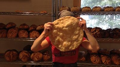 Suzanne sloman, hiding behind a large tortilla