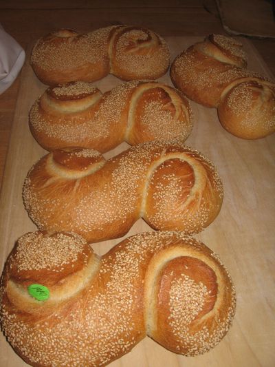 a mass of semolina loaves on the oven loader
