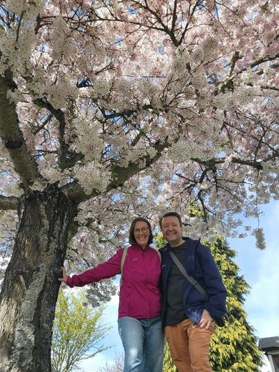 Cin and Mark under the canopy of a cherry tree, Thurlow Street, Victoria