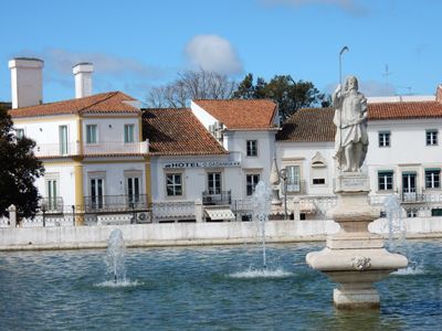 View of our hotel in Estremoz, with a water fountain in foreground.