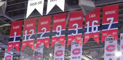 row of retired jersey numbers at Montreal Forum