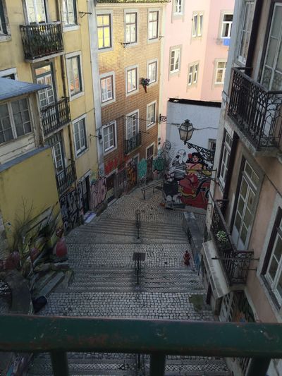 View looking down a very steep sidewalk