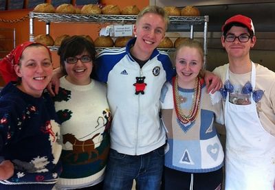 bakery crew in their Xmas sweaters