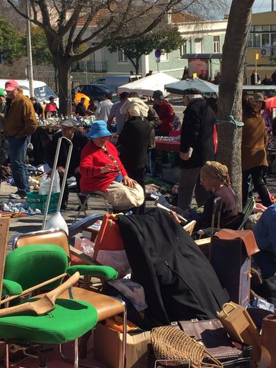 two grandmas selling at the market